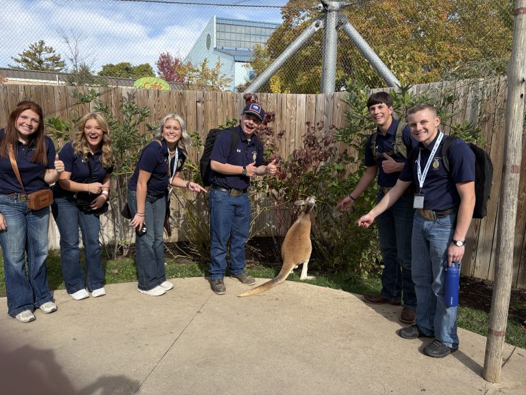 Wyoming State Officers pose with a kangaroo