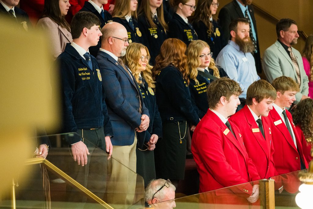 Wyoming FFA members stand alongside other Career and Technical Student Organization students in the Wyoming Senate chamber during CTE Month recognition.